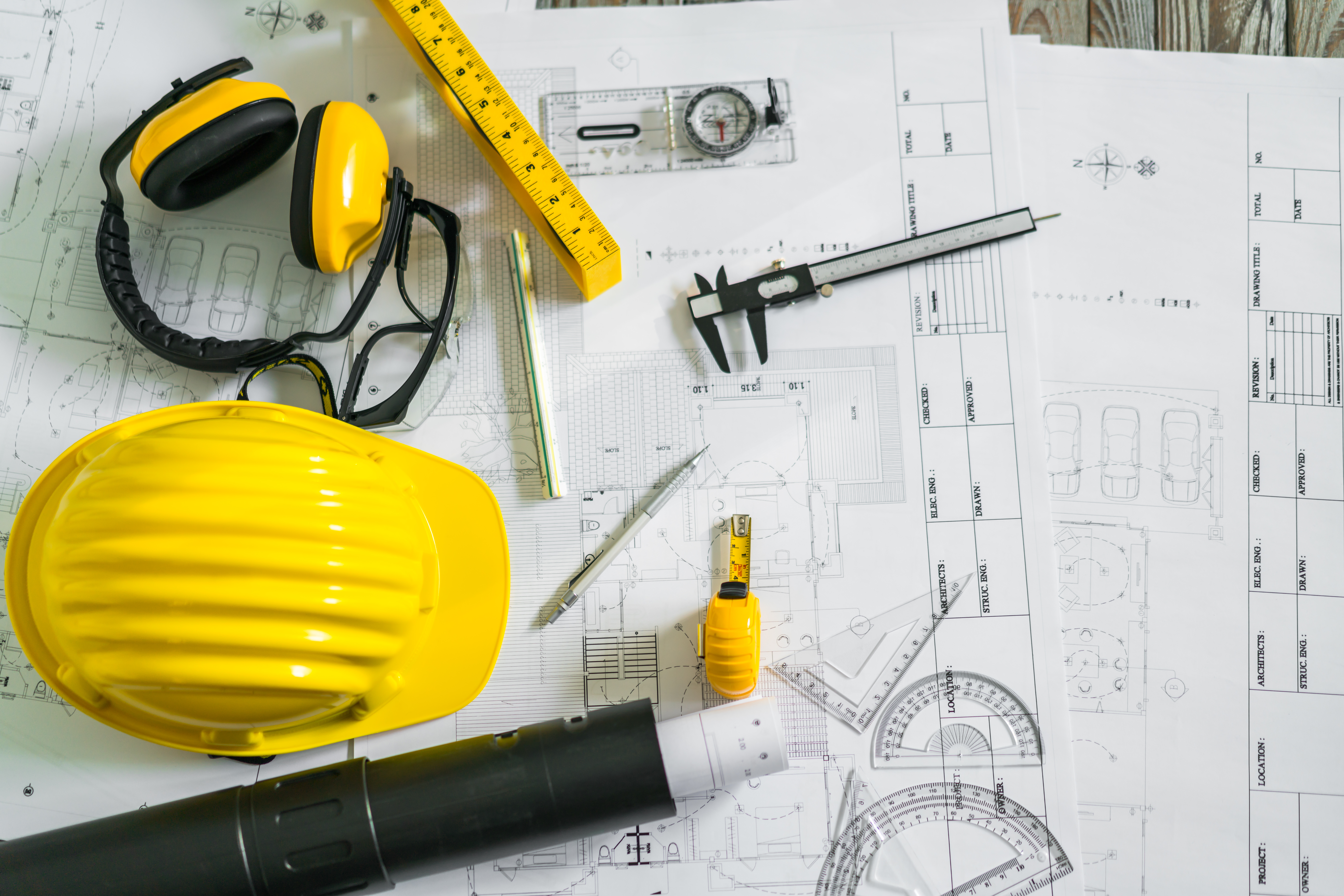 Construction Plans With Helmet And Drawing Tools On Blueprints .
